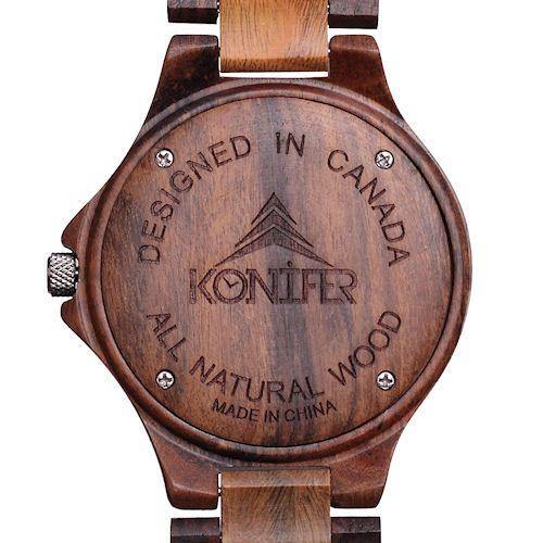 Montre en bois marron fonce a cadran rond. Vue arriere du cadran