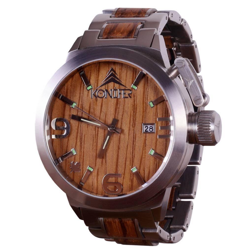 Montre en metal et en bois zebre a cadrzn rond. vue de profil