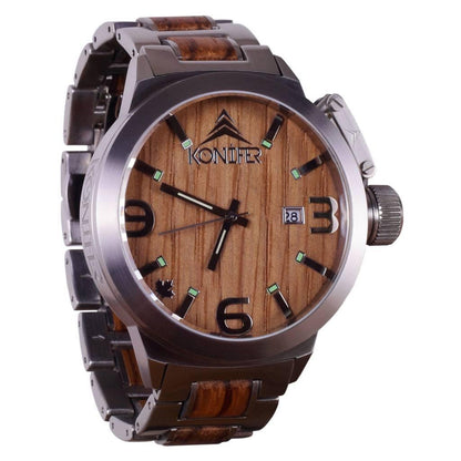 Montre en metal et en bois zebre a cadrzn rond. vue de face