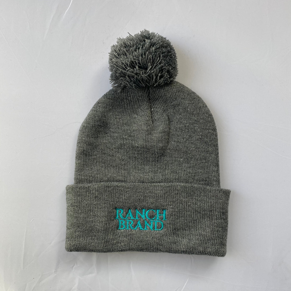 Pompom Hat | Gray &amp; Gray Flap | Logo Turquoise