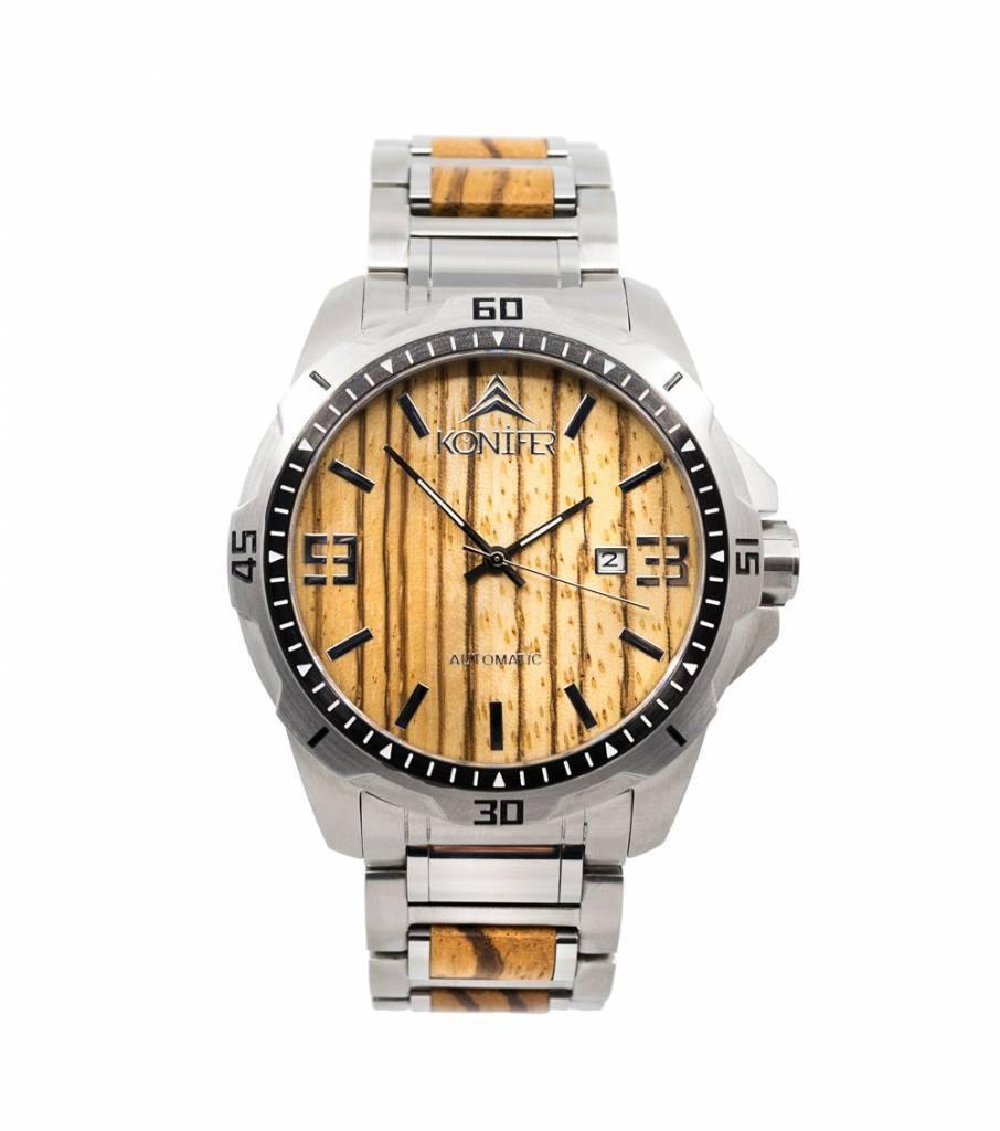 Montre en metal et en bois zebre a cadran rond. Vue de face